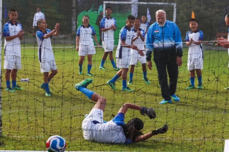 Prime Minister Narendra Modi playing football with children during Sikkim statehood celebrations
