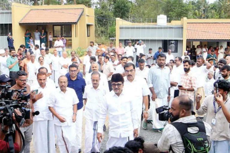 Landslide survivors in Wayanad entering newly built rehabilitation homes during simple ceremony