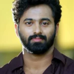 Actor Unni Mukundan reacting to the controversial Vishu advertisement featuring Lord Krishna in a restaurant promotion