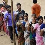Voters standing in long queues at polling booths in Tamil Nadu during high turnout election day