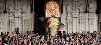 Elephant carrying idol during Thrissur Pooram temple festival opening ceremony