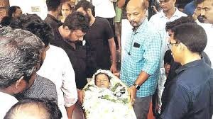 Young boy recovering after snake bite treatment in Kerala hospital with family emotional response