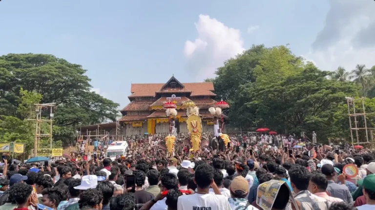 Massive crowd at Thrissur Pooram festival watching decorated elephant Thechikkottukavu Ramachandran