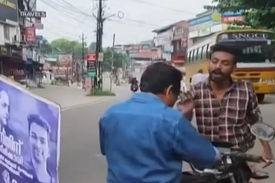 Youth confronting hartal supporter blocking bike during protest in Thodupuzha Kerala
