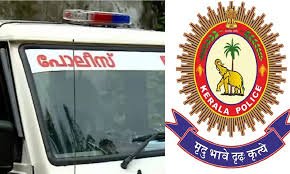 Kerala police officers rescuing a man from suicide attempt inside a house in Kottarakkara