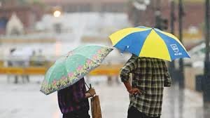 Heavy summer rain with dark clouds over Kerala city roads