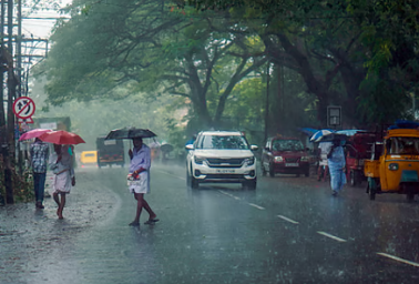 Kerala Rain Alert with orange and yellow warnings across multiple districts