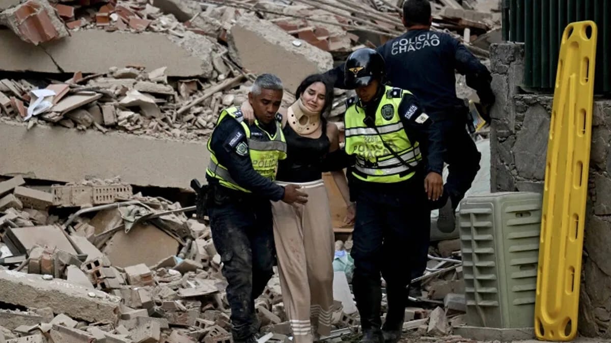 Venezuela Earthquake Disaster with rescue teams searching through collapsed buildings