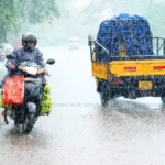 Kerala Rain Alert with heavy monsoon clouds and rainfall across Kerala districts